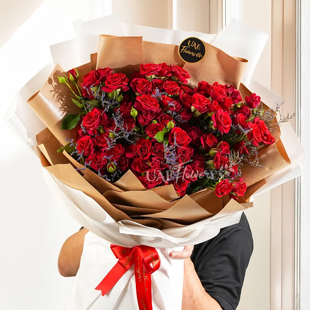 20 red spray roses with limonium