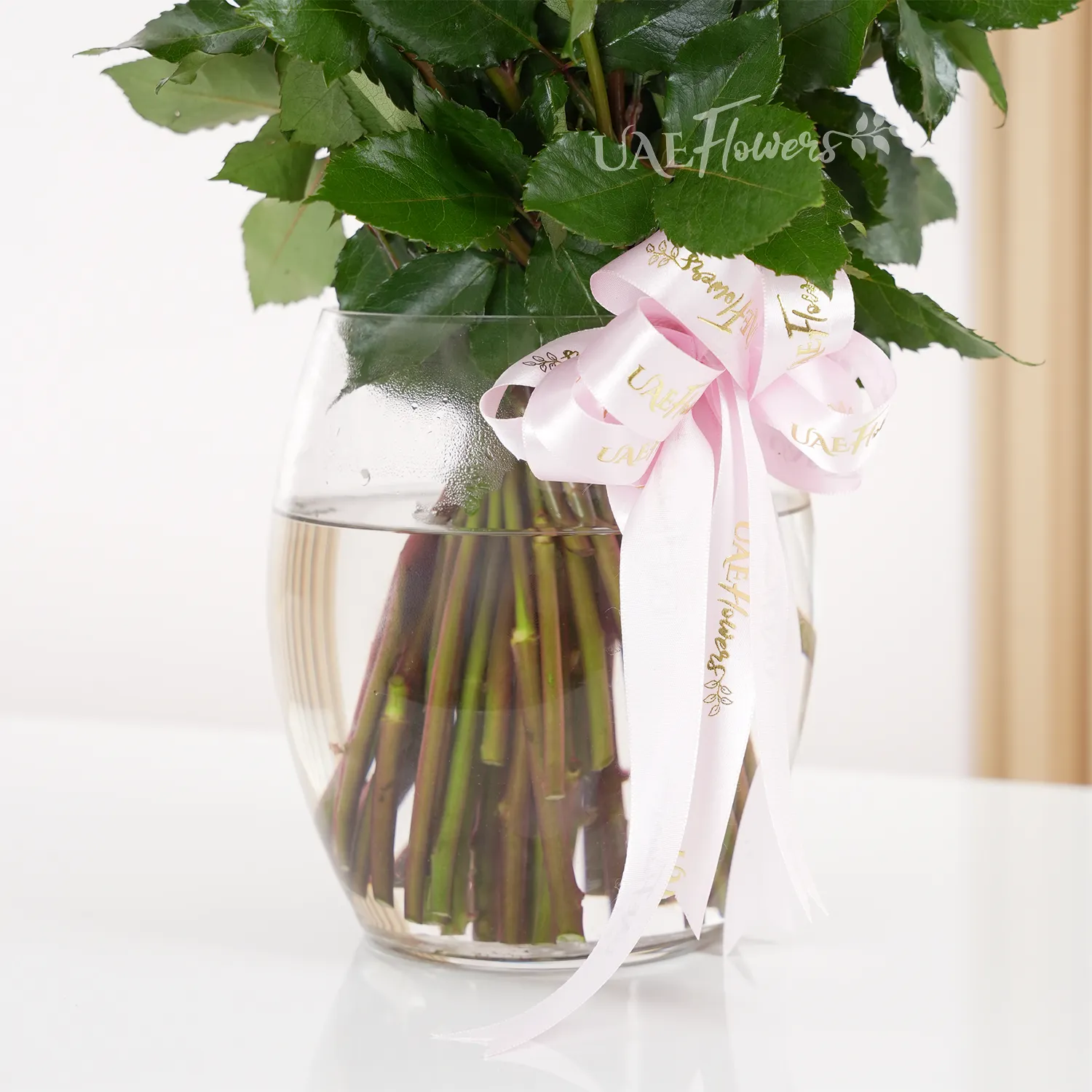 40 purple roses and green fillers, tied with pink ribbons