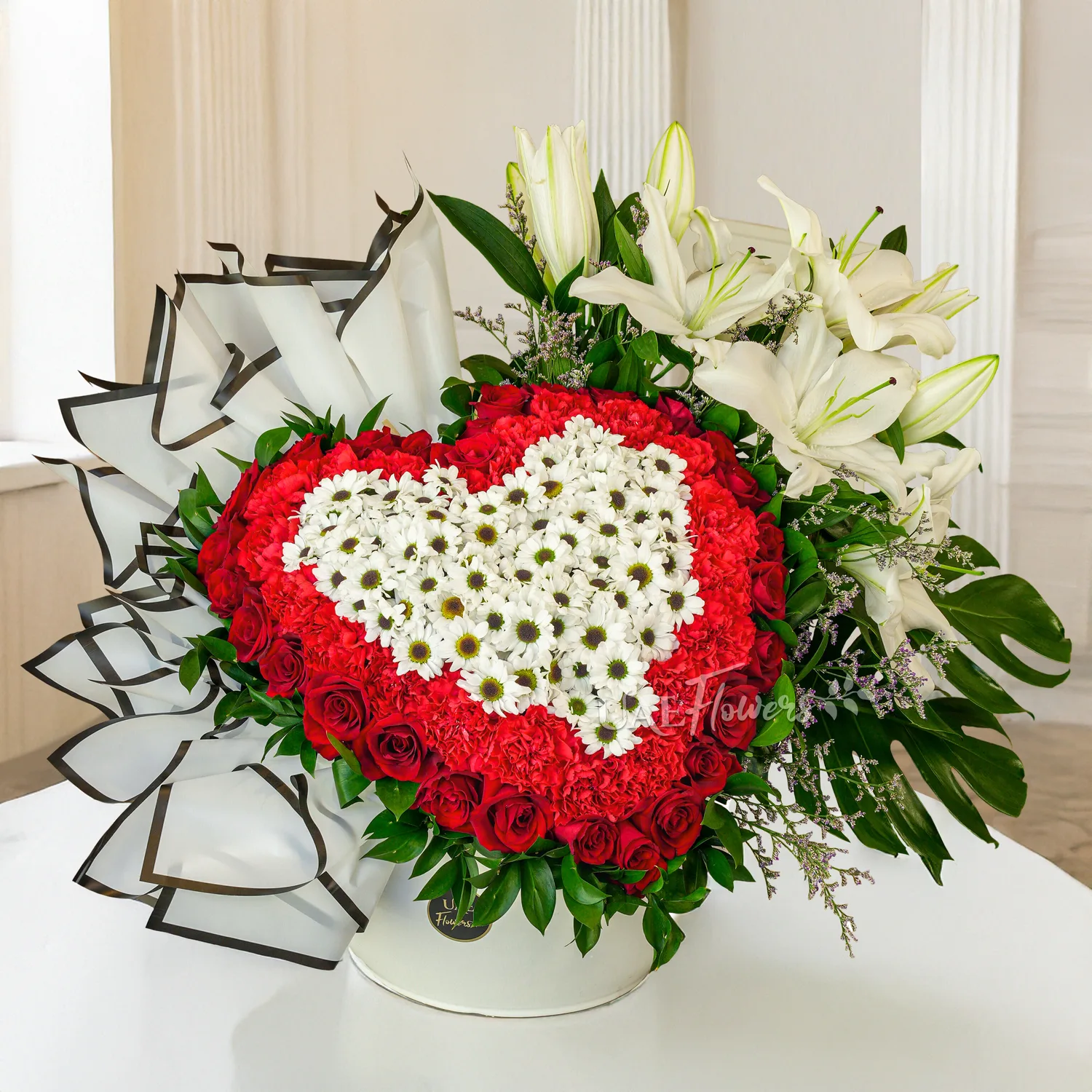 30 red roses, 30 red carnations, 10 white chrysanthemums, and 3 white lilies