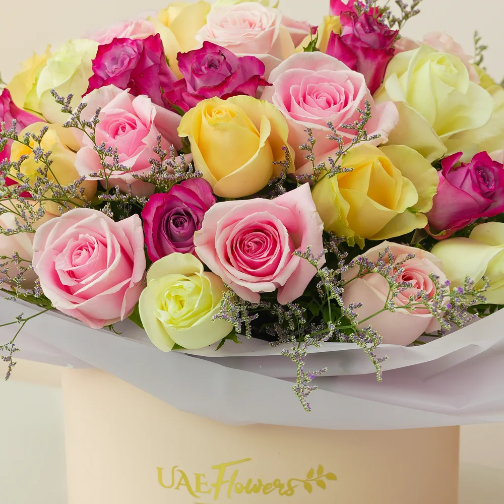 box of 30 roses in purple, pink, peach and white shades