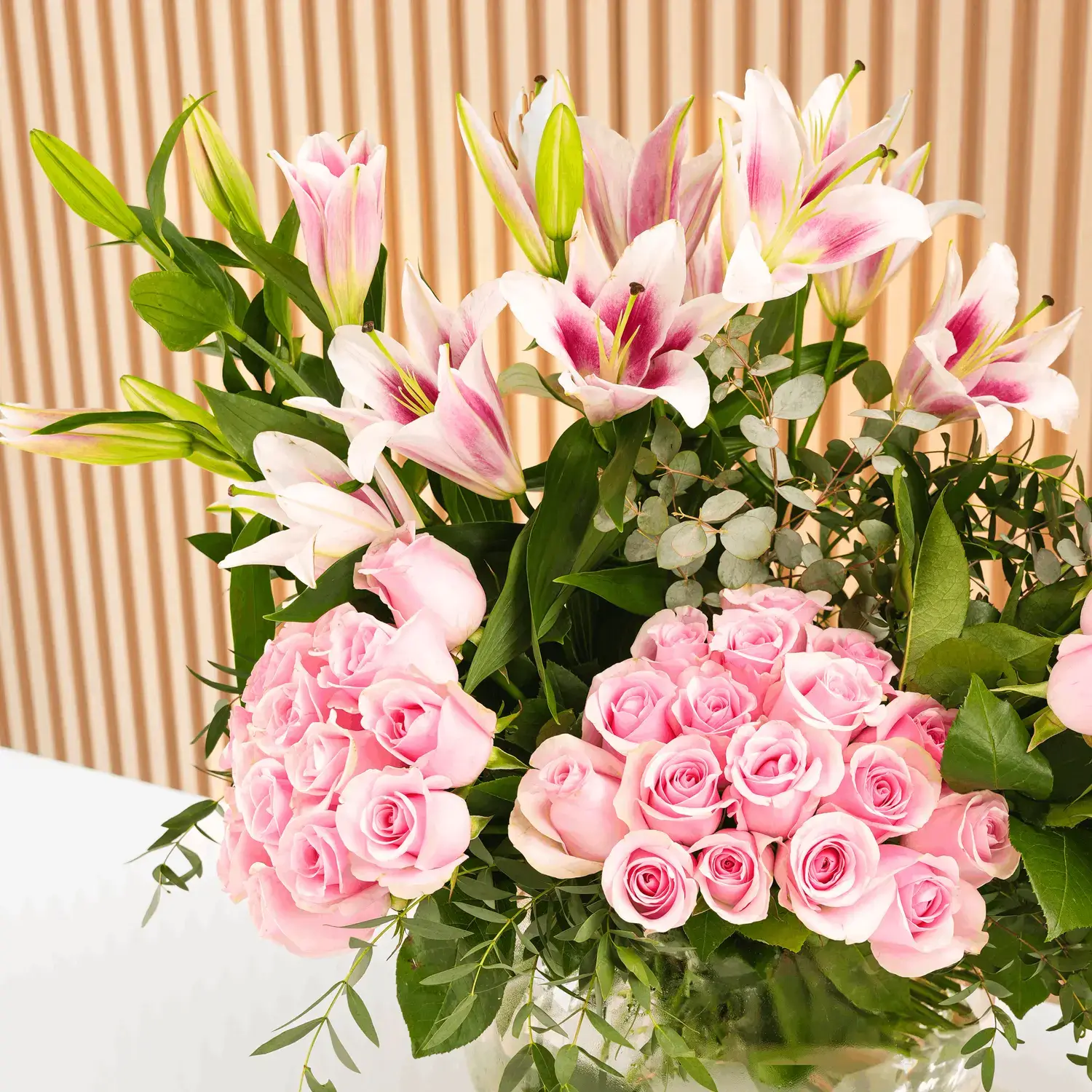 45 pink roses and 3 pink lilies